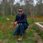 Howard Greenstein with Kalinyiot flowers